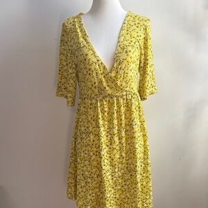 PrettyLittleThing Yellow Floral Wrap Mini Dress